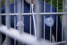 Laden Sie das Bild in den Galerie-Viewer, Zweitauflage auf Vorbestellung: Trainingsjacke "Love Schalke Hate Racism"